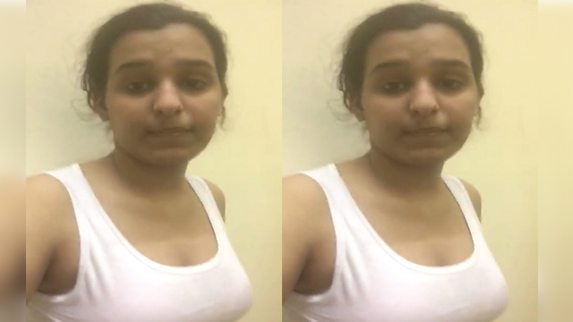Cutie with innocent look, showing boobs